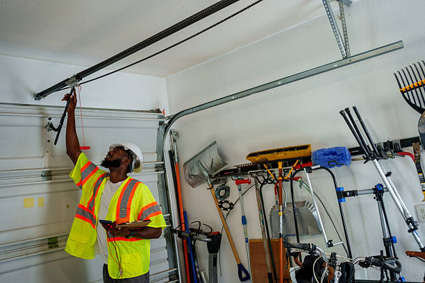 Professional Garage Door Installation technician working in Owensville, IN
